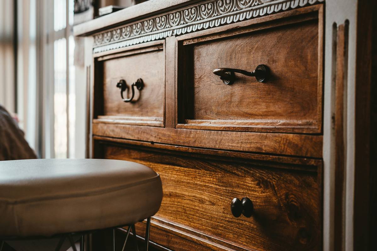 storage unit furniture drawers in a modern bedroom dresser with soft-close mechanism